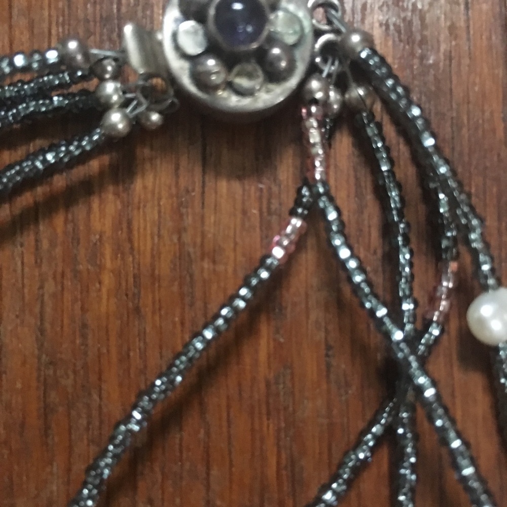 Cool beaded necklace with asymmetrical  pendent